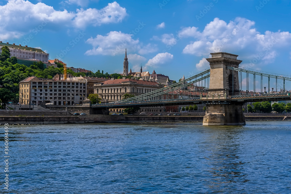 A view of the Chain Bridge and Fisherman's Bastion on the west bank of the River Danube in Budapest during summertime