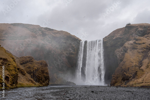 Skogarfoss waterfall in Iceland on an overcast day