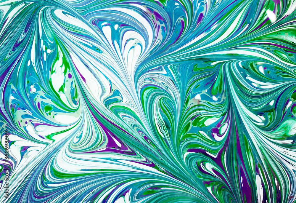 The background is painted in a variety of colors in the Ebru style The background is painted in a variety of colors in the Ebru style