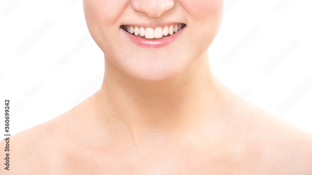 Obraz premium Healthy white smile close up. Beautiful young girl with perfect smile, lips and teeth