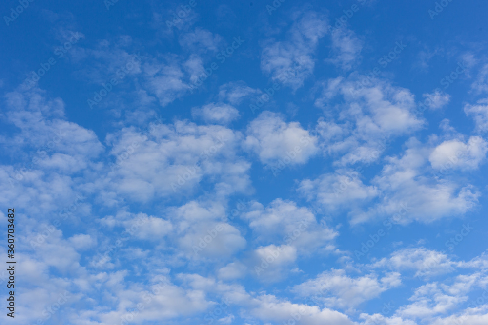 White clouds on a blue blue sky. White clouds on a blue blue sky.