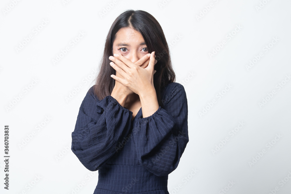 Beautiful young Asian woman close her mouth. Beautiful young Asian woman close her mouth.