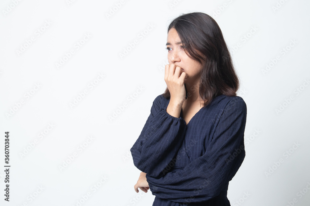 Unsure hesitant nervous young asian woman biting her fingernails. Unsure hesitant nervous young asian woman biting her fingernails.