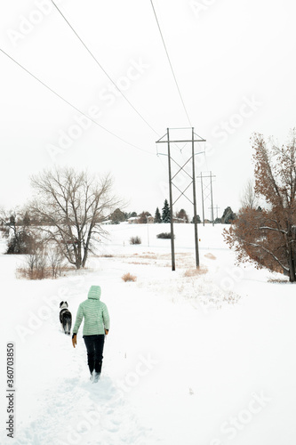 woman walking in winter park