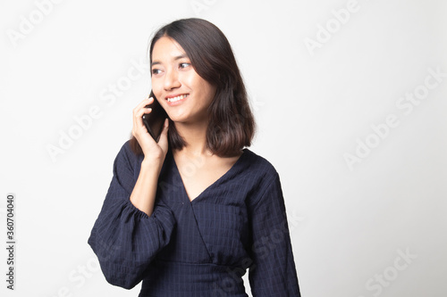 Young Asian woman talking with mobile phone.