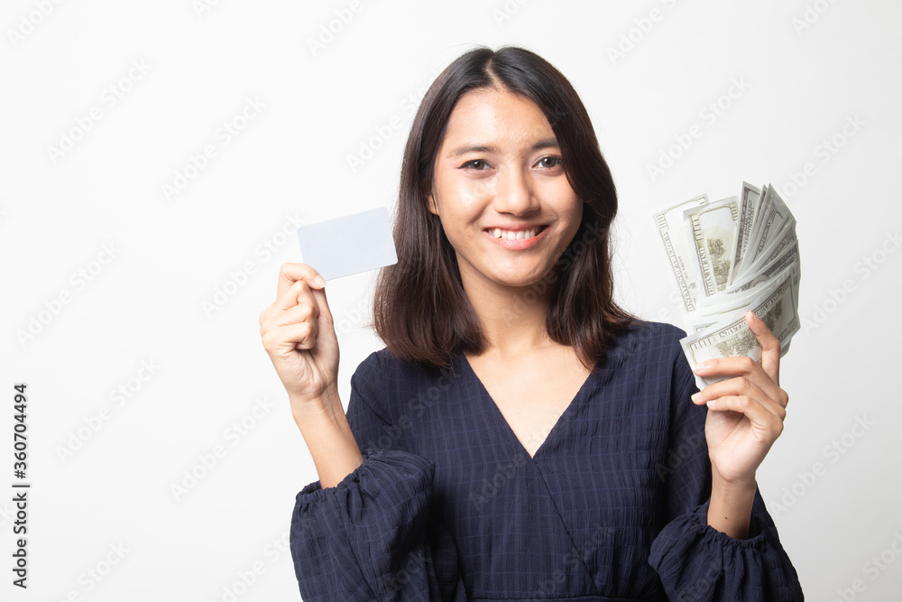 Portrait of young asian woman showing bunch of money banknotes. Portrait of young asian woman showing bunch of money banknotes.