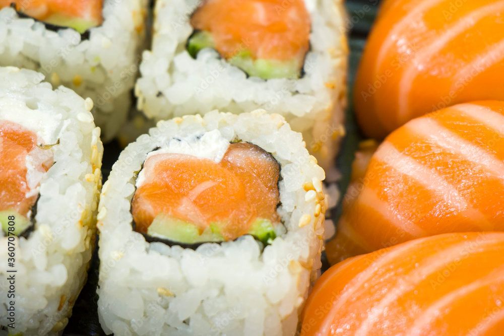 Sushi set on the table. Seafood close-up and macro Sushi set on the table. Seafood close-up and macro