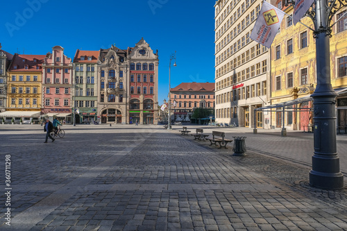 Market Square, Wroclaw, Poland - April 21, 2019: Central square in Wroclaw Old Town since the Middle Ages, surrounded by ornamented and colorful frontages of historical tenement houses. © MoVia1