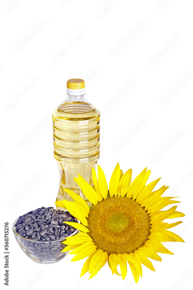 Bottle of sunflower oil with flower and seed isolated on white background Bottle of sunflower oil with flower and seed isolated on white background