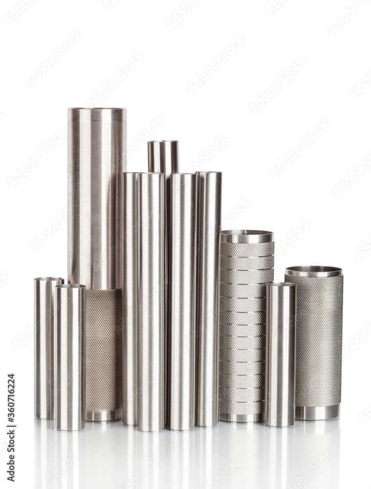 Stack of metal pipes. Chrome steel tubes isolated on white background Stack of metal pipes. Chrome steel tubes isolated on white background
