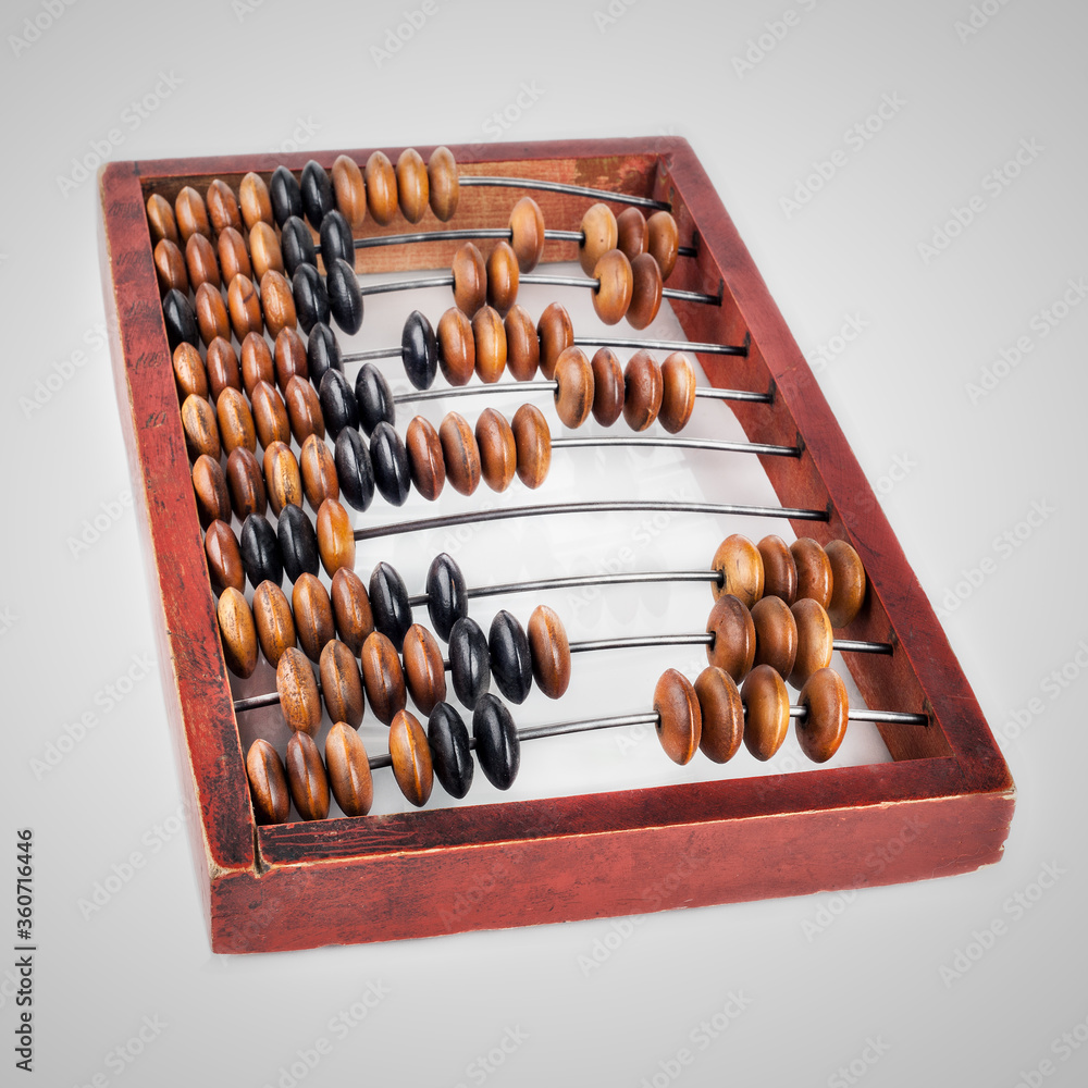 Old accounting wooden abacus isolated on white. Computing scores Old accounting wooden abacus isolated on white. Computing scores