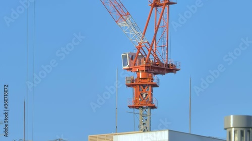 Wallpaper Mural The tall red crane outside the warehouse in Japan Torontodigital.ca