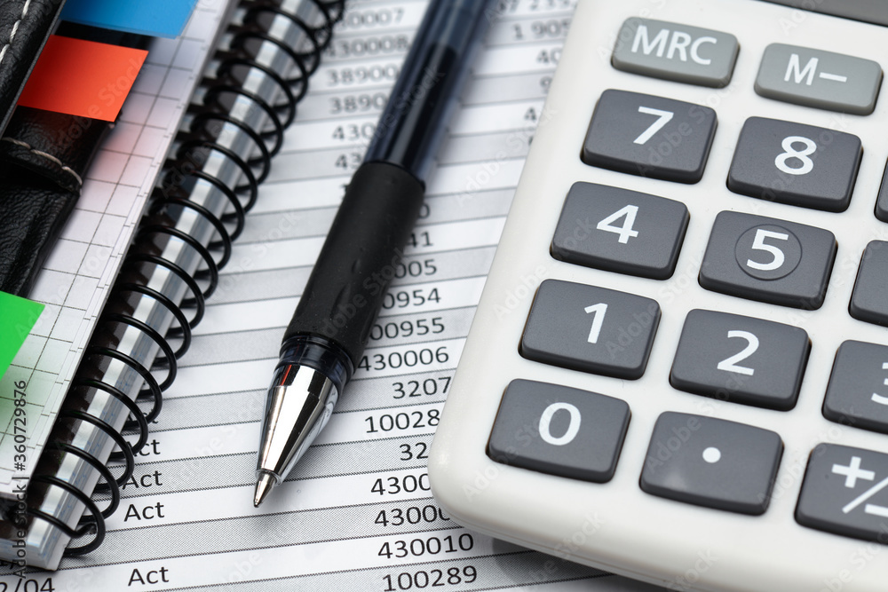 business office desk closeup - financial reports, analysis and accounting, set of documents, tables and graphs, various items for bookkeeping, calculator business office desk closeup - financial reports, analysis and accounting, set of documents, tables and graphs, various items for bookkeeping, calculator