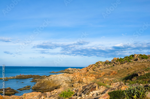 Tropical beach with rocks and blue sea in Vietnam