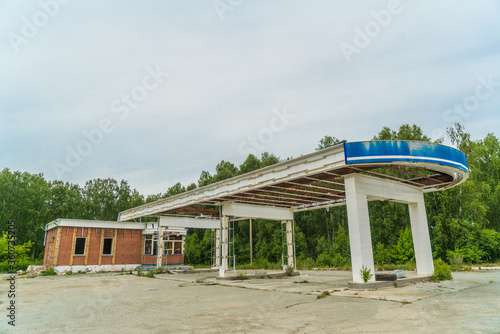 Abandoned gas station, gasoline prices, business collapse, post-apocalypse © gerasimov174