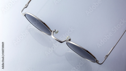 Classic round sunglasses on white background. circle sunglasses isolated