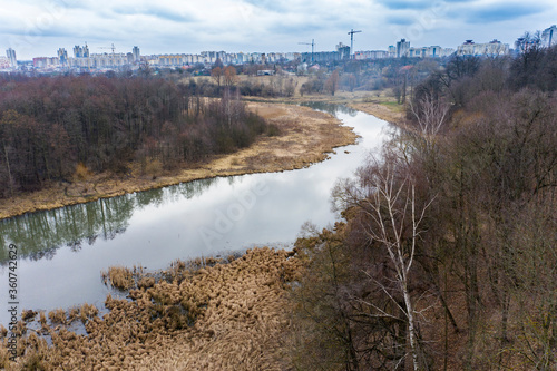 Fototapeta Naklejka Na Ścianę i Meble -  Drone shot flying on the spring city park