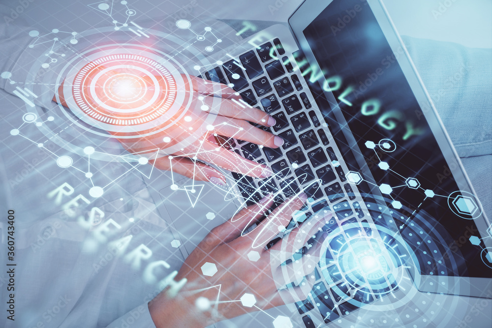 Double exposure of woman hands working on computer and data theme hologram drawing. Top View. Technology concept.