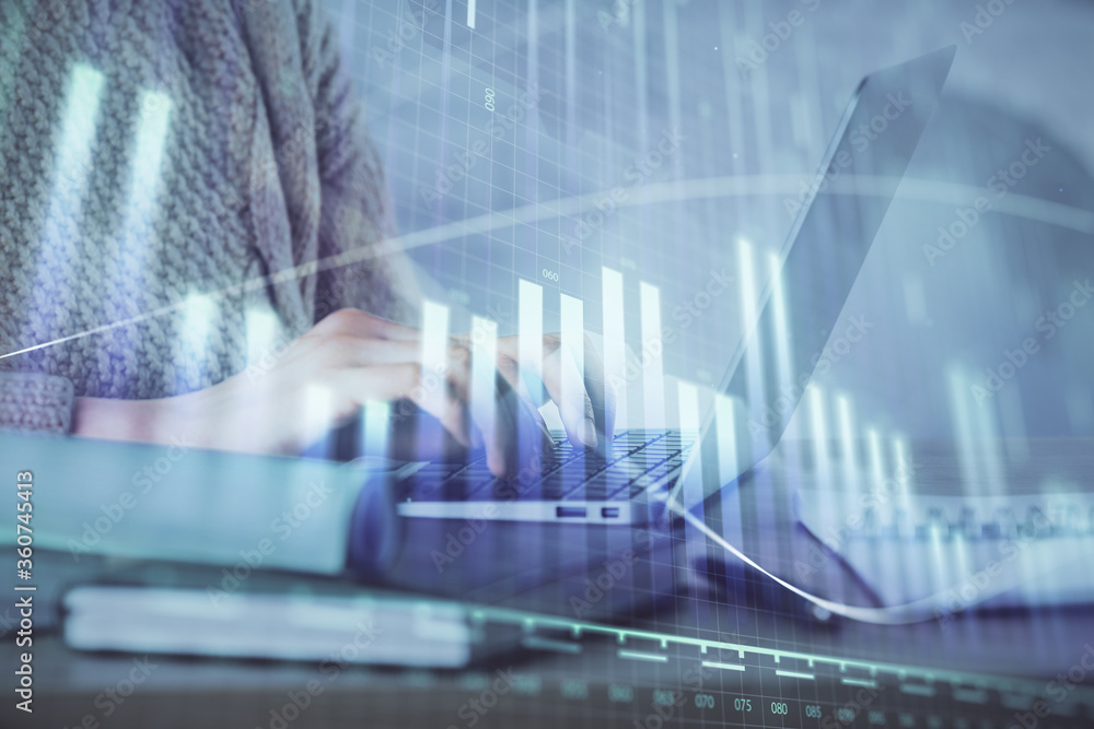 Double exposure of woman hands typing on computer and forex chart hologram drawing. Stock market analysis concept. Double exposure of woman hands typing on computer and forex chart hologram drawing. Stock market analysis concept.