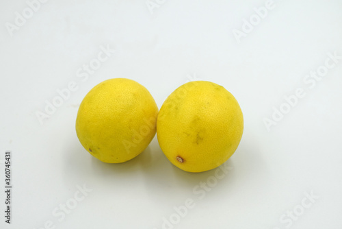 fresh lemons on white background