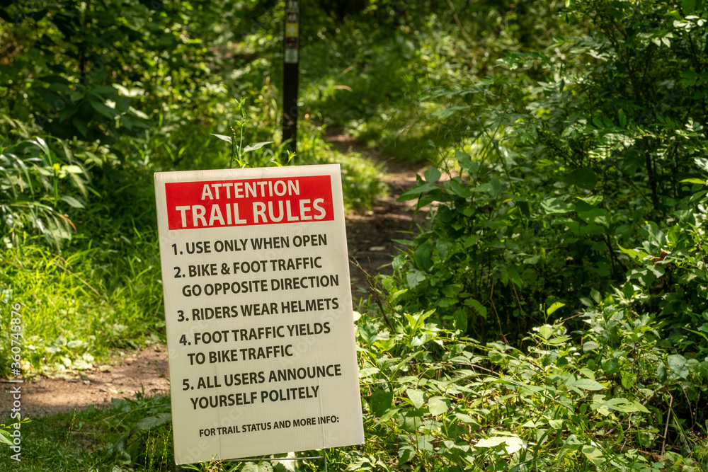 Sign on trailhead giving rules for the trail