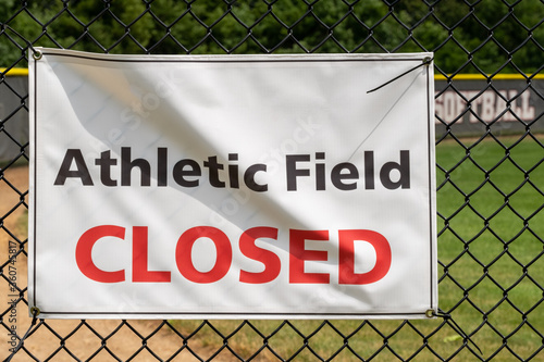 Sign on a Baseball field indicating that it is closed due to Covid 19