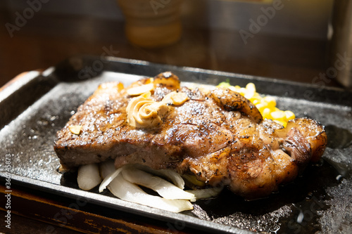 grilled steak on hot plate