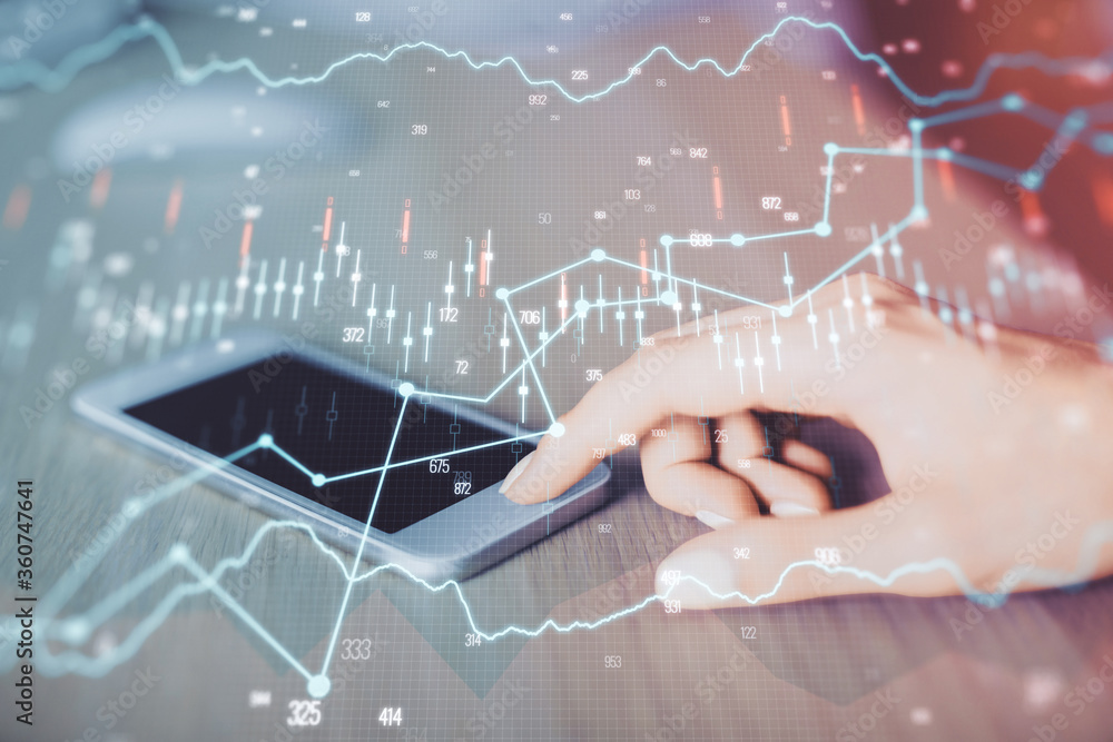 Double exposure of forex chart sketch hologram and woman holding and using a mobile device. Financial market concept. Double exposure of forex chart sketch hologram and woman holding and using a mobile device. Financial market concept.