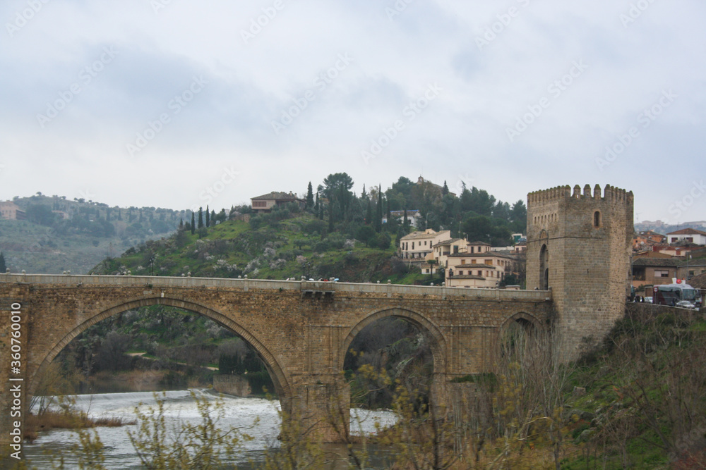 Roman bridge Puente de Alcántarain Toledo Spain