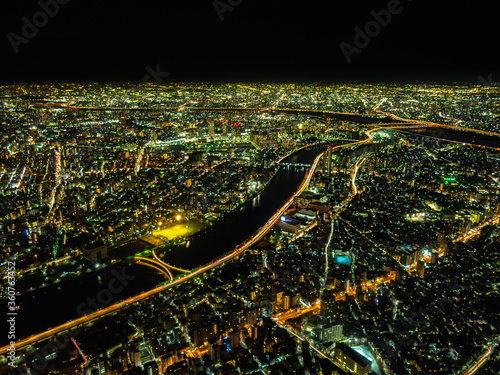 Tokyo city at night, the vast metropolis  spreads out  to the horizon as viewed from the Skytower
