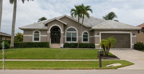 Typical private home at an affluent residential area on Marco Island, Florida.