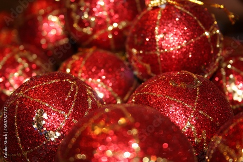 Slika na platnu Red and shiny Christmas ornaments  coated in glitter