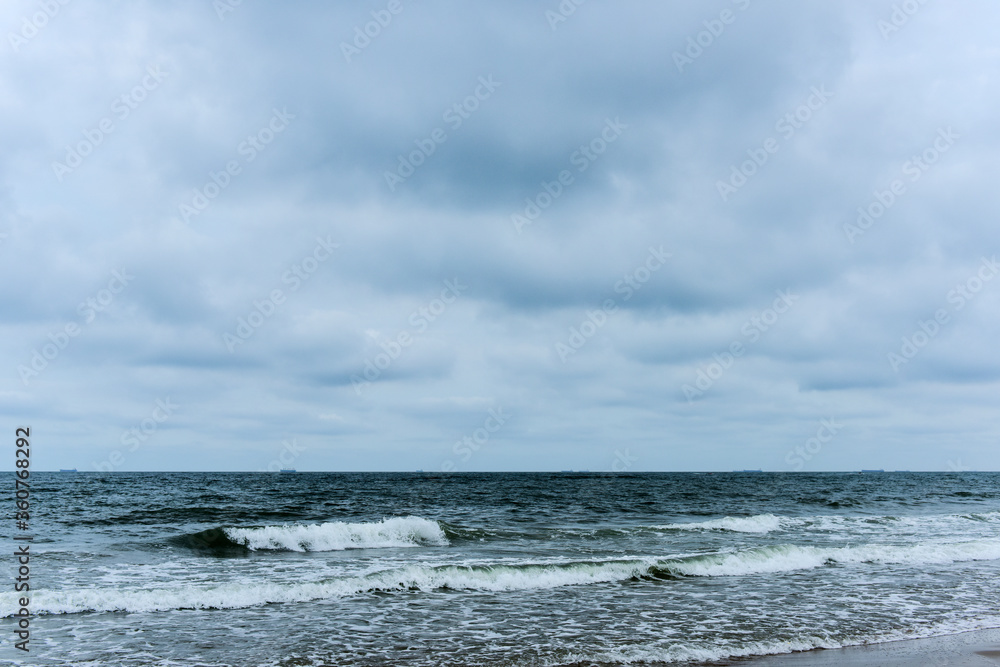 Coastline in the background of dark clouds