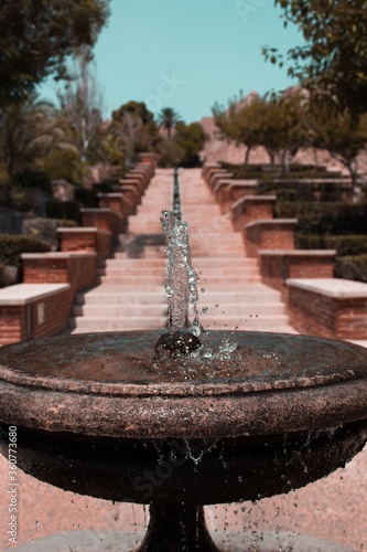 Vertical shot of Fountain in the Alcazaba of AlmerÃ­a, Spain photo