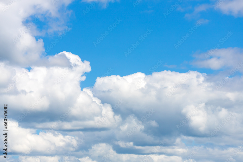 Obraz premium blue sky background with tiny clouds in summer season