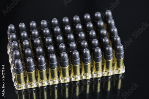 Ammunition for weapon shooting on a black background 