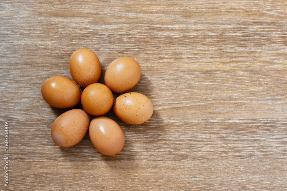 Eggs on a wooden background. Place for text. Food concept. Eggs on a wooden background. Place for text. Food concept.