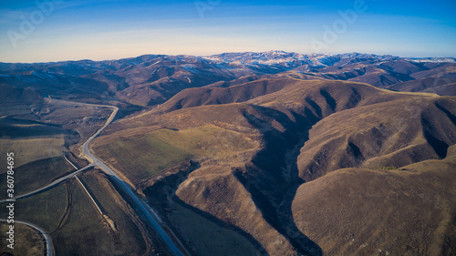 The road between the hills. Mountain landscape.