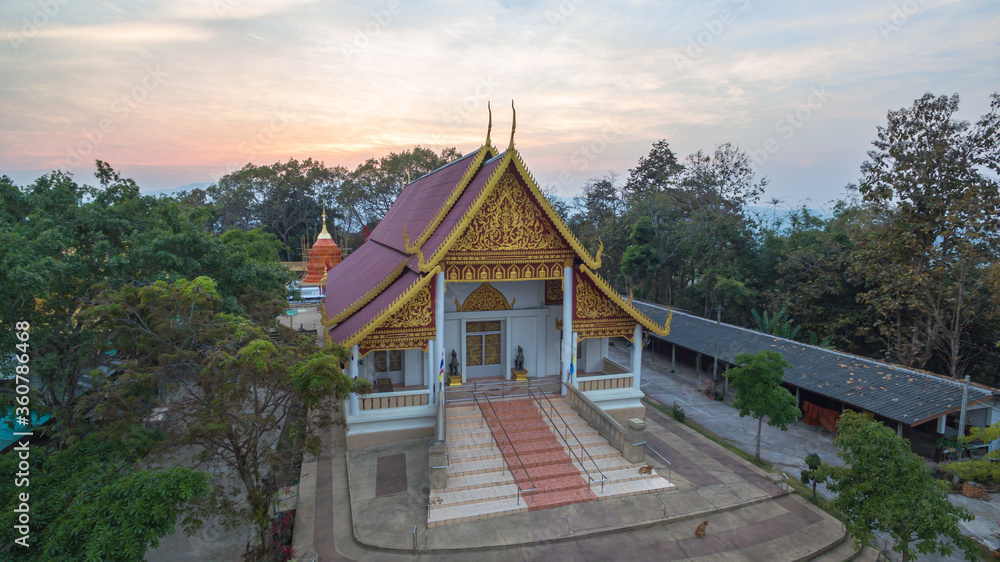 .aerial view pavilion of wat Phra That Jom Wae or Black Scorpion Temple Chiang Rai.Phra That Jom Wae temple is on the high mountain