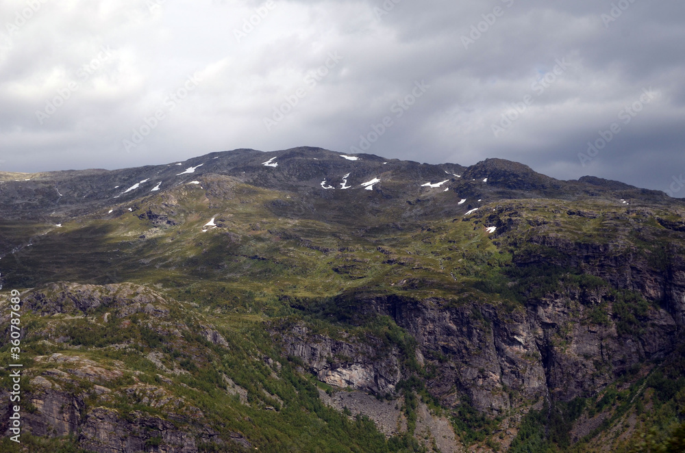 Views from the train window. Mountain tundra of Central Norway. Railway travel in Norway.The Bergen - Oslo train.