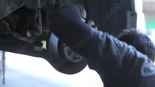 person working on a machine