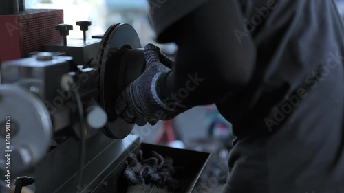 person working on a machine