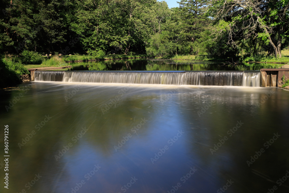 small artificial waterfall at Milham park in Kalamazoo Michigan small artificial waterfall at Milham park in Kalamazoo Michigan