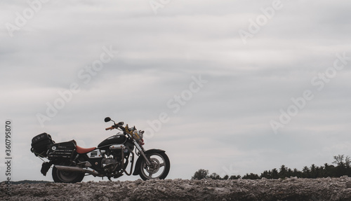 Fototapeta Naklejka Na Ścianę i Meble -  Freedom. Motor bike under sky ready to go