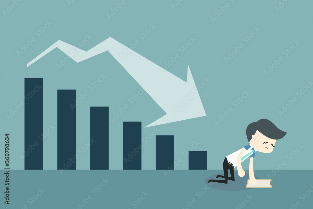 Serious and fail business man sit with falling down chart toward the economic financial crisis on background Serious and fail business man sit with falling down chart toward the economic financial crisis on background