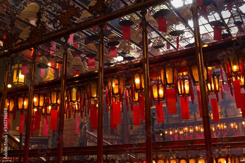 Traditional wooden and glass Chinese lanterns at the Man Mo Temple in Hong Kong