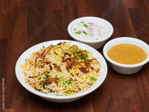 Chicken Biryani is a savory chicken and rice dish that includes layers of chicken, rice, and aromatics that are steamed together.
