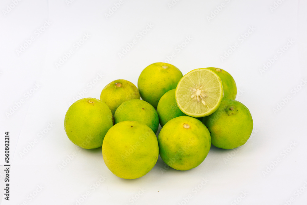 lemons and limes isolated on white background