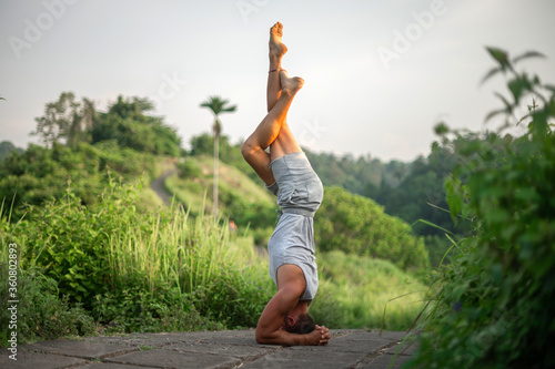 Man practice Yoga practice and meditation outdoor