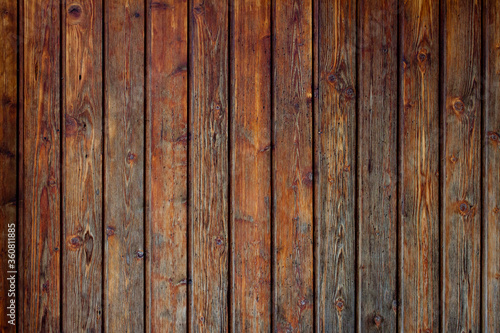 Brown wood pallets or planks wall varied vertical texture for background
